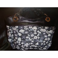 Bolso trenzado combinado con simil y lona